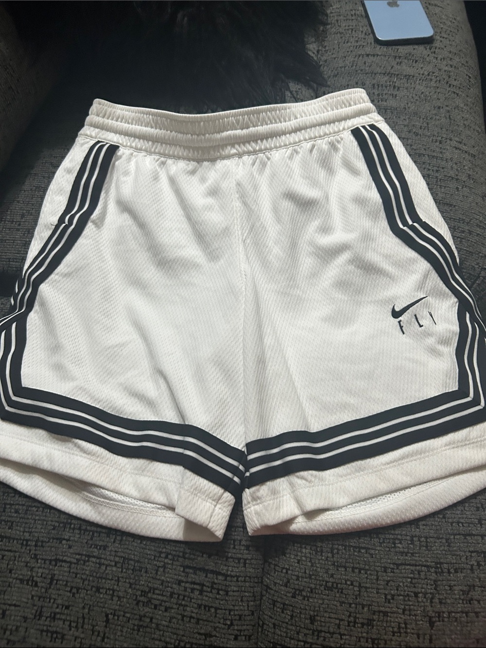 Nike White Athletic Mesh Shorts with Black Stripe Accents